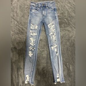American Eagle next level stretch size short 00 ripped jeans in good condition
